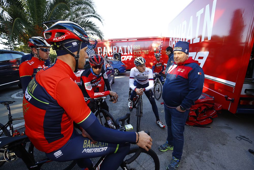 Paolo Slongo chats with riders at Bahrain-Merida team camp