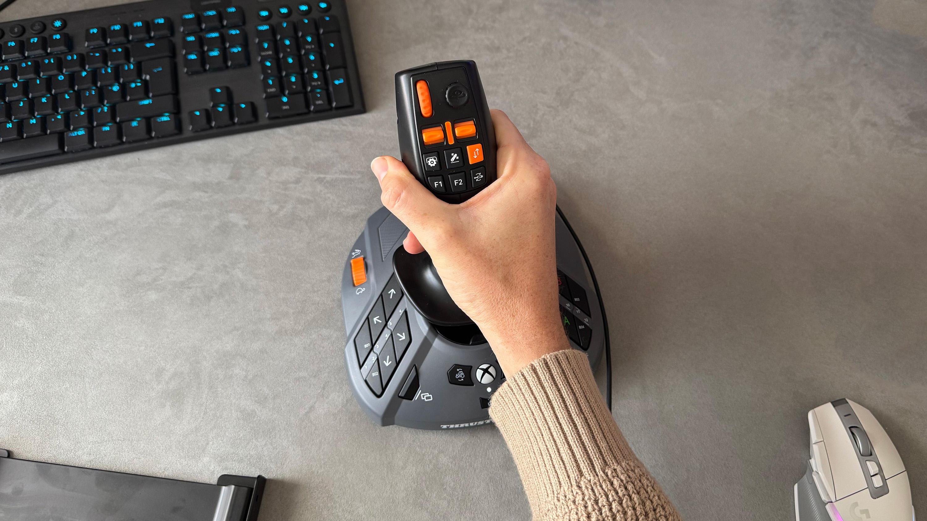 The Thrustmaster SimTask Farmstick on a desk