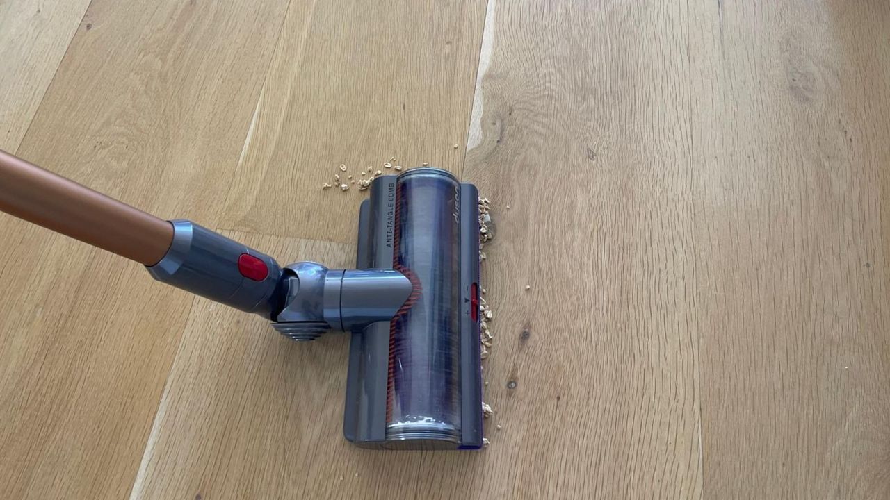 Dyson V15 vacuuming cereal