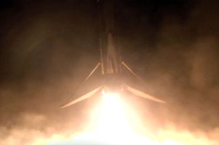 A SpaceX Falcon 9 rocket's first stage touches down on Landing Zone 4 (LZ-4) at Vandenberg Space Force Base in California on Sunday, Dec. 24, 2024.