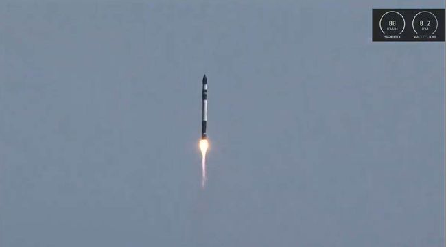 Rocket Lab launches satellite for US spysat agency, guides booster back to Earth