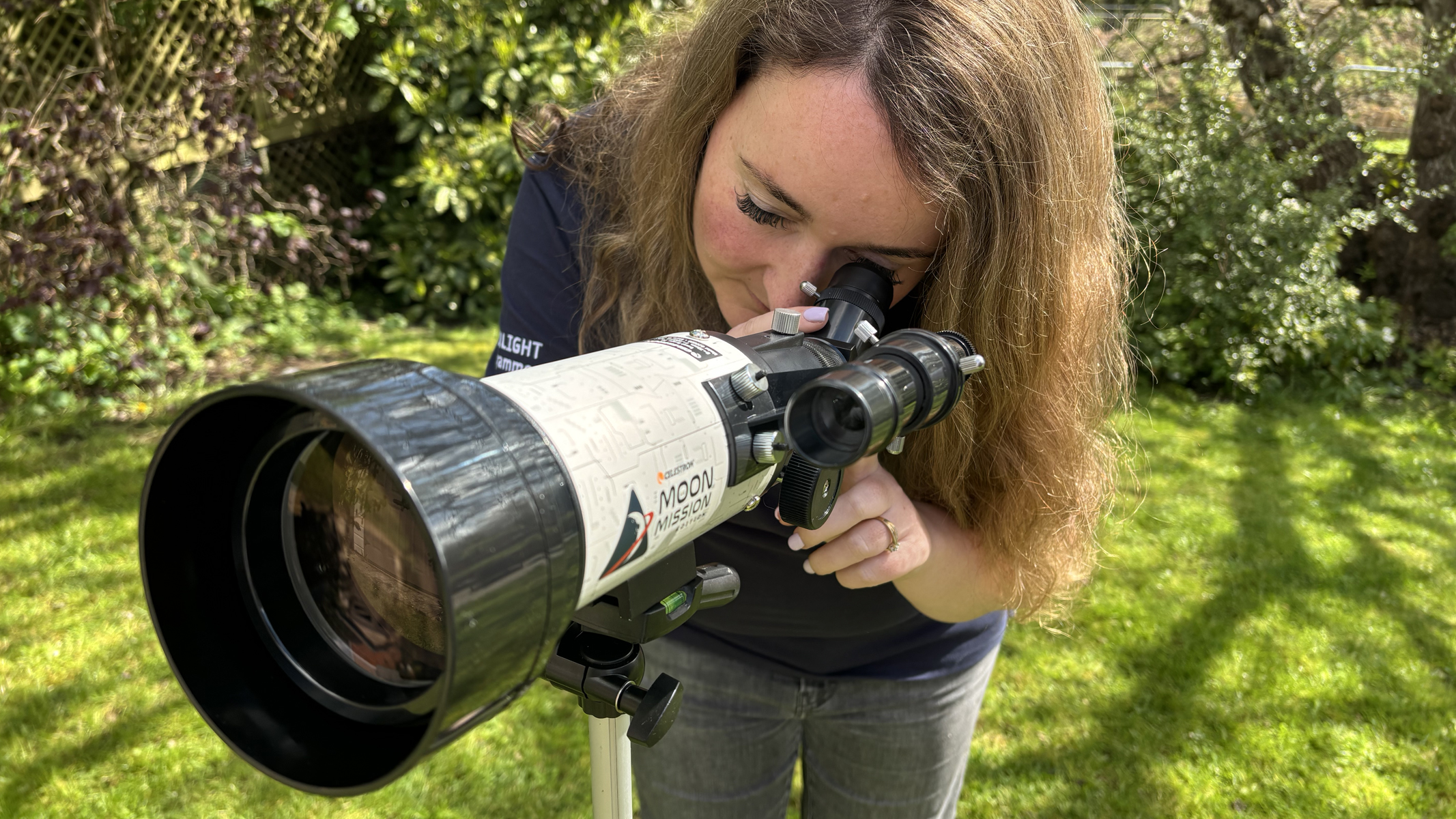 Author Gemma Lavender with a Celestron Moon Mission Travel Scope 70.