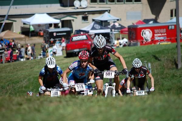 The front of the elite women's field, led by Abigail Strigel (Trek Stores of Madison), crests the first of several climbs on the way to the top of the Grand Geneva ski resort.