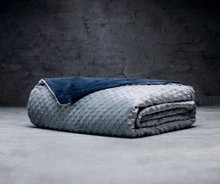 Luxome Weighted Blanket in gray and blue.