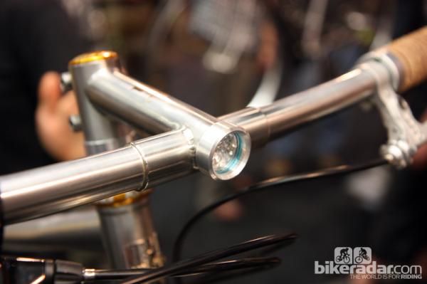 Sam Whittingham of Naked Bicycles integrated the front light right into the stem extension - clean and functional.