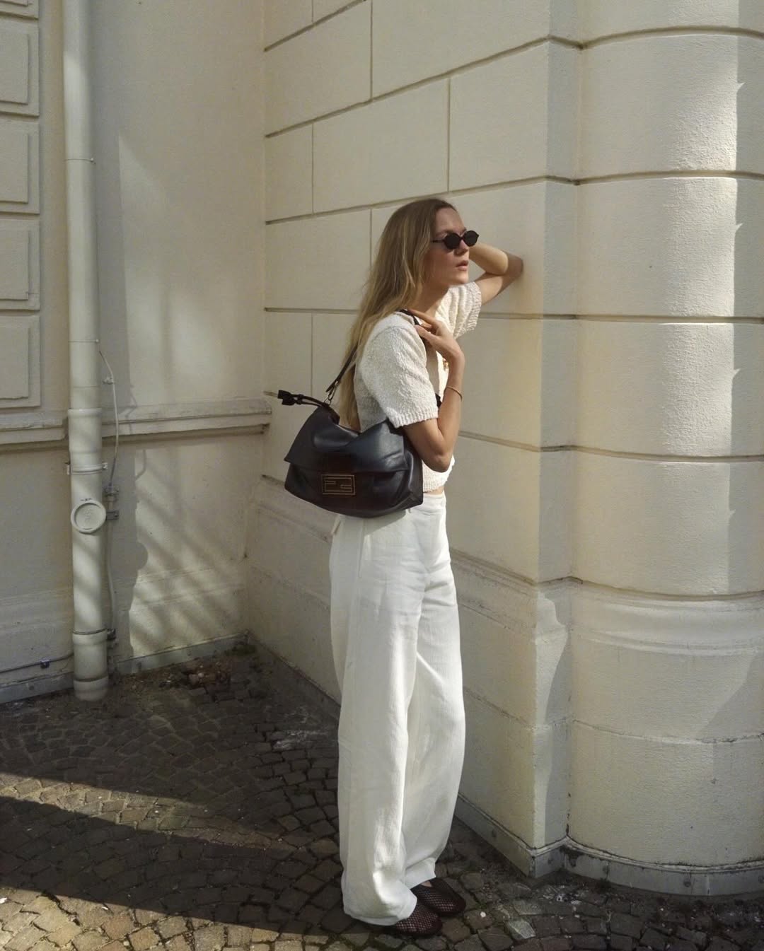model wears white Aiayu set