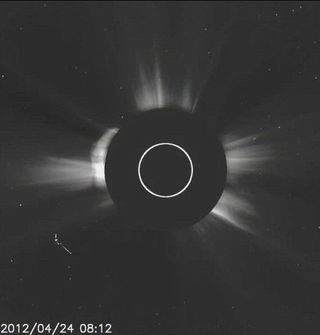 A strangely shaped object near the sun in a new NASA image has drawn the attention of UFO believers.