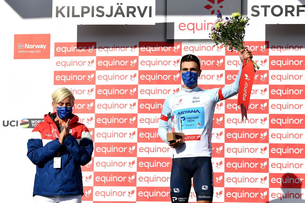KILPISJARVI FINLAND AUGUST 06 Samuele Battistella of Italy and Team Astana Premier Tech White Best Young Rider Jersey celebrates at podium during the 8th Arctic Race Of Norway 2021 Stage 2 a 178km stage from Nordkjosbotn to Storfjord Kilpisjrvi Finland ArcticRace on August 06 2021 in Kilpisjarvi Finland Photo by Stuart FranklinGetty Images