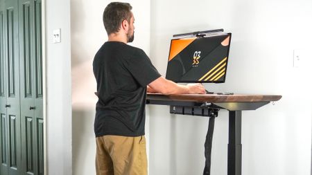 A person working at a standing desk