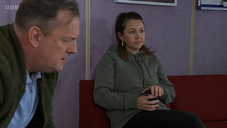 Stacey Slater and Harvey Monroe talk in the hospital waiting room