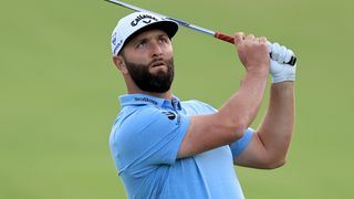 Jon Rahm takes a shot during a pro-am before the 2023 DP World Tour Championship