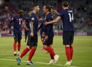 Griezmann, second right, celebrates France's goal against Germany with his team-mates