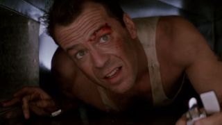 Bruce Willis as John McClane in an air duct in Die Hard