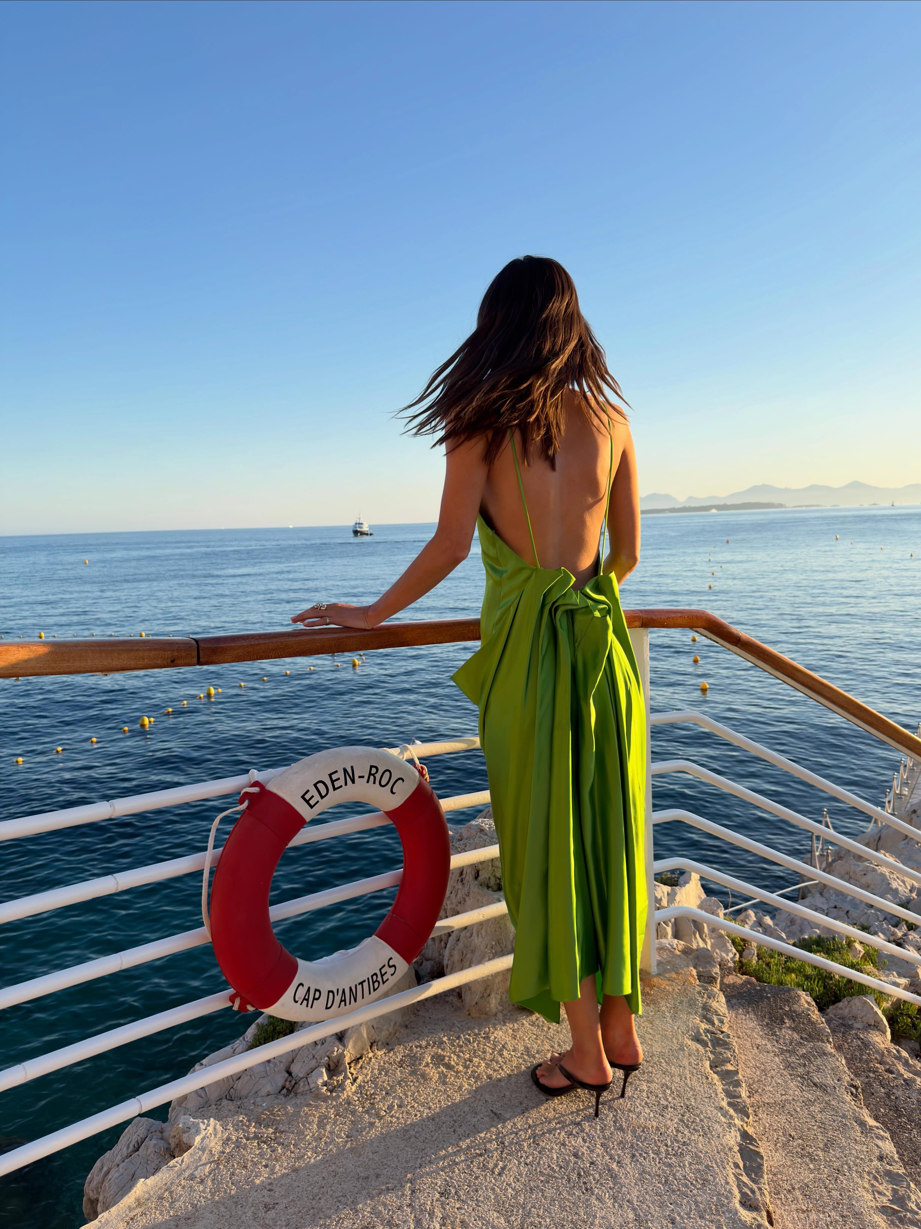 An image of a woman wearing best backless dress summer 2026
