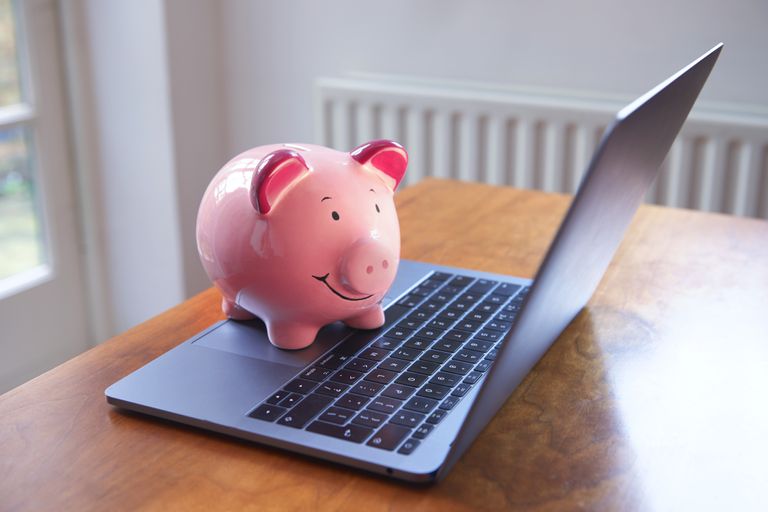 piggy bank on laptop