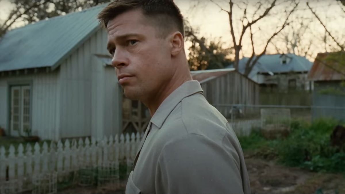 Brad Pitt looking to the side at dusk in The Tree Of Life.