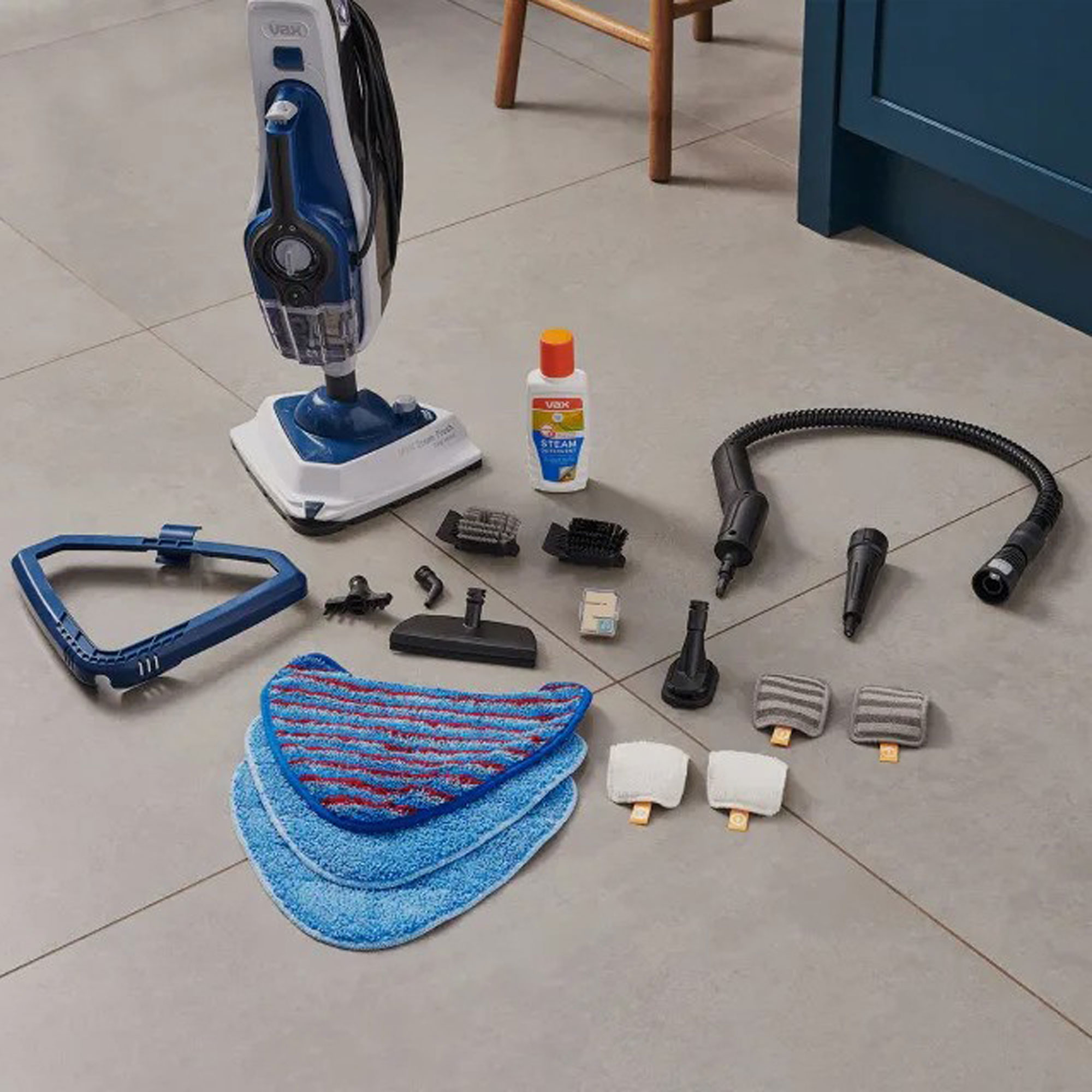 VAX steam fresh total home steam cleaner parts on a floor