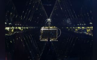 Studded bag in black show set at fashion exhibition