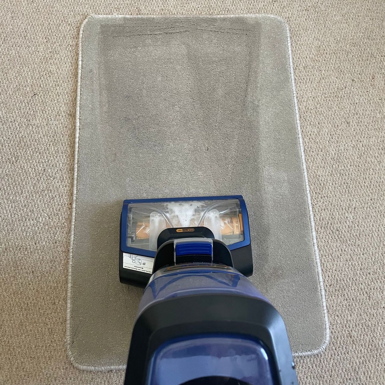Cleaning a carpet sample with the Shark CarpetXpert HairPro Pet Deep Carpet Cleaner with Spot Cleaner EX250UK