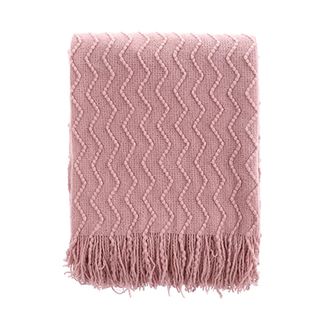pink textured throw with tassels 