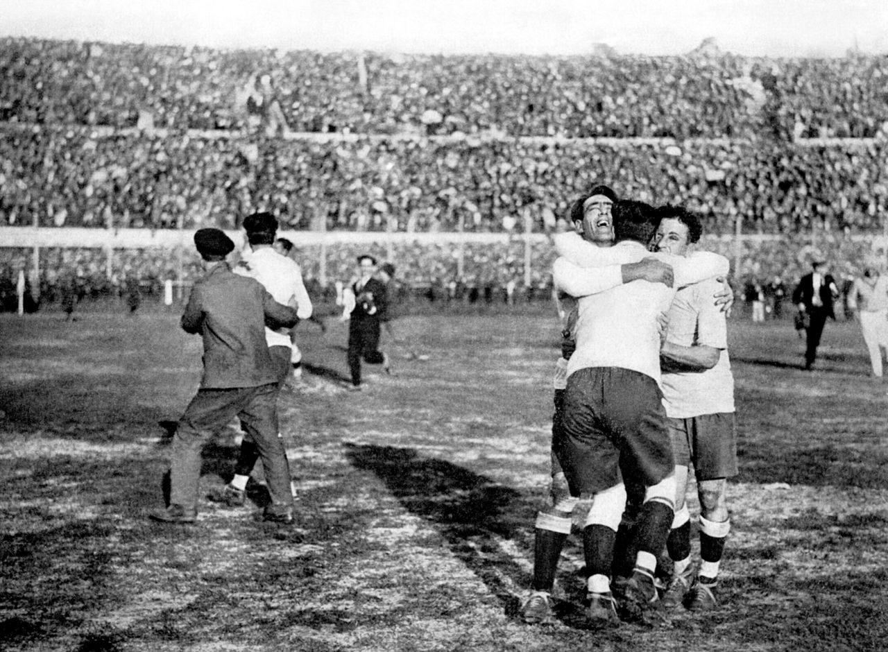 Uruguay players celebrate victory in the 1930 World Cup final