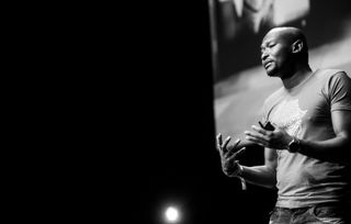 Afro-centric UX designer Mark Kamau speaking at Design Indaba