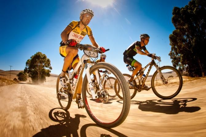 Christoph Sauser and Burry Stander ride to defend their titles at Cape Epic