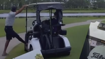Tiger Woods watching his son Charlie play golf