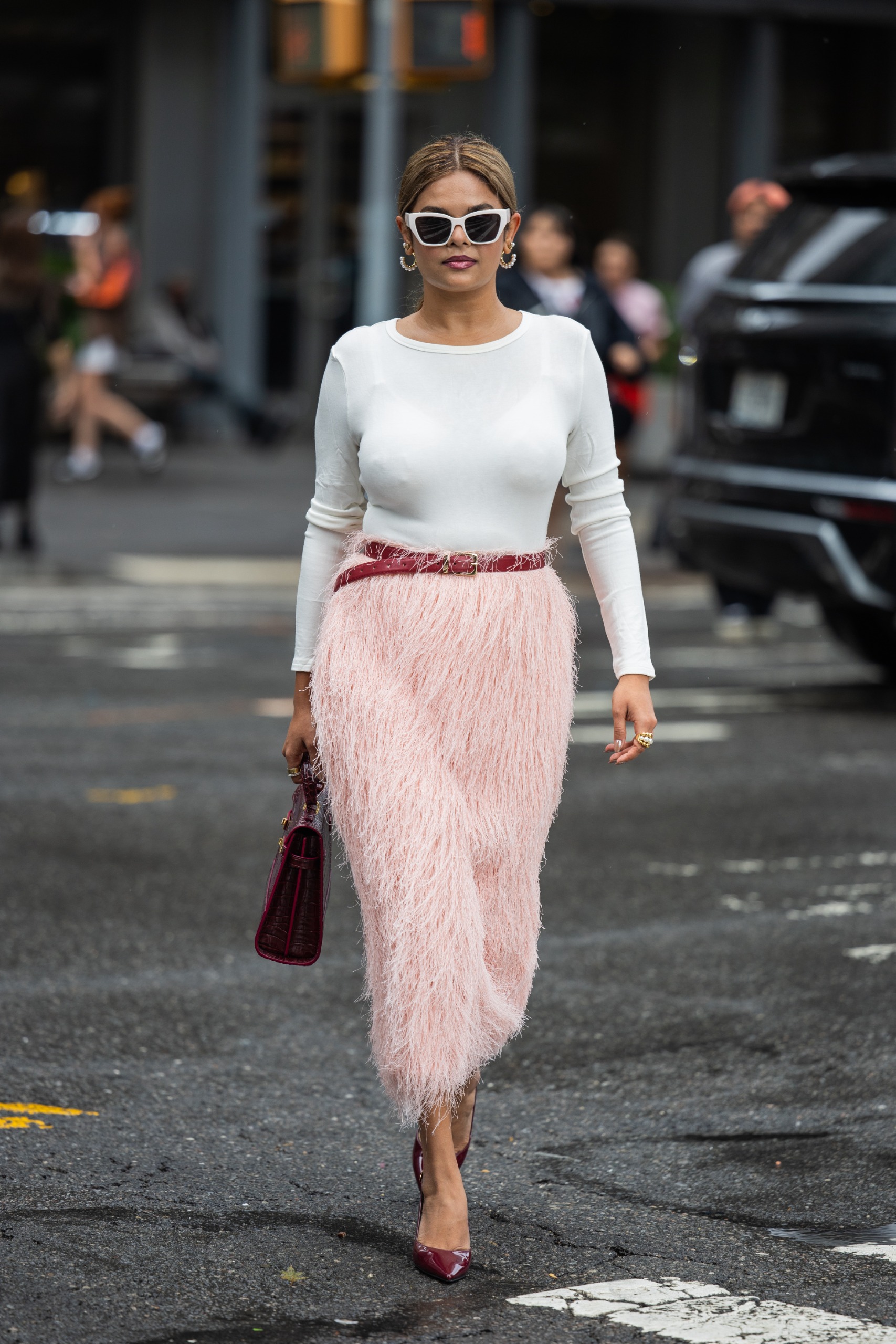 A guest wore the statement skirt trend at New York Fashion Week 2026