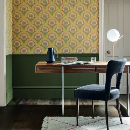 hencroft home office design with hencroft wallpaper on top half of the wall and dark green paint below dado rail