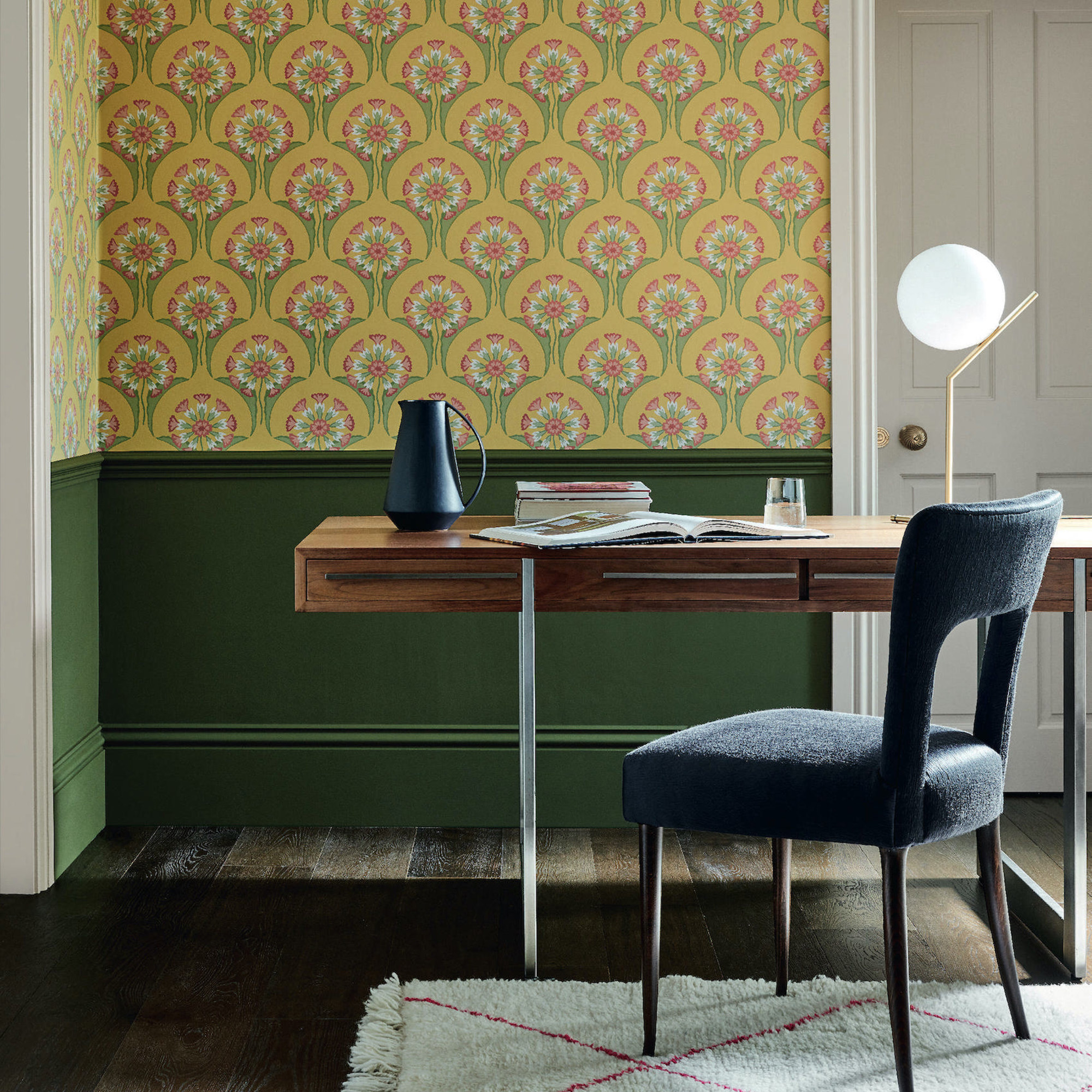 hencroft home office design with hencroft wallpaper on top half of the wall and dark green paint below dado rail