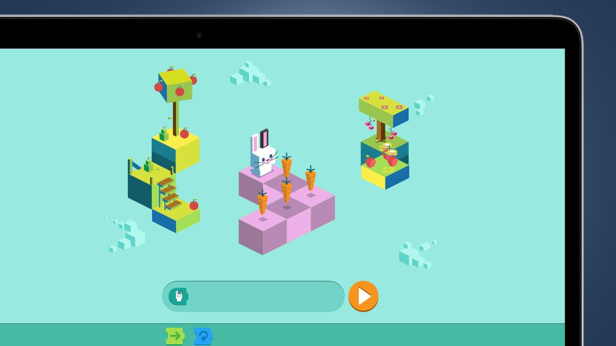 A laptop screen on a blue background showing a Google Carrot for Coding game