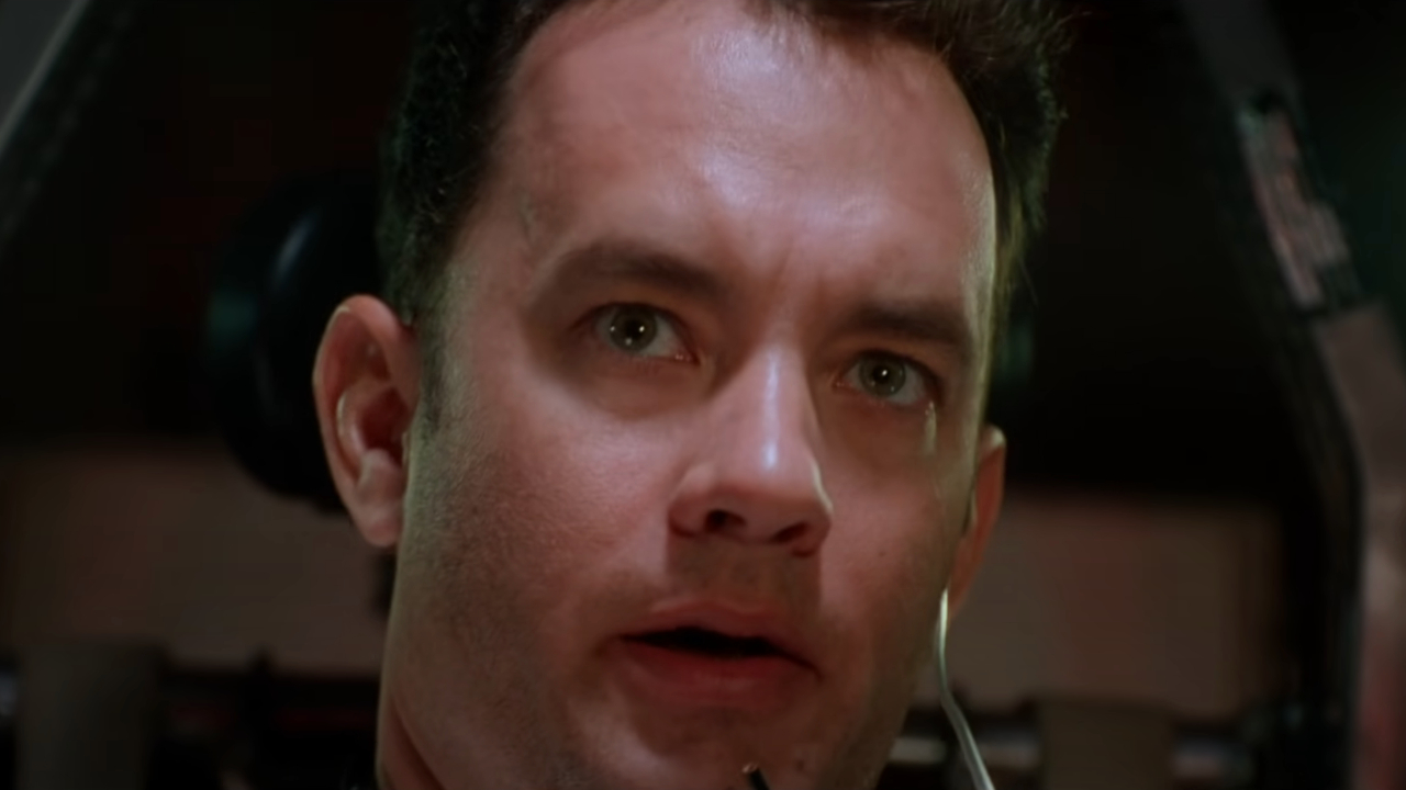 Tom Hanks with a look of concern in Apollo 13.