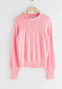 Ruffled Collar Wool Knit Sweater| £85| &amp; Other Stories
This pink jumper features long sleeves and a ruffled colour and honeycomb structure across the chest and is a wool and alpaca blend knit. 