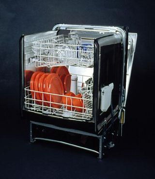 A photograph of a dishwasher with dishes inside from the back, without the case.