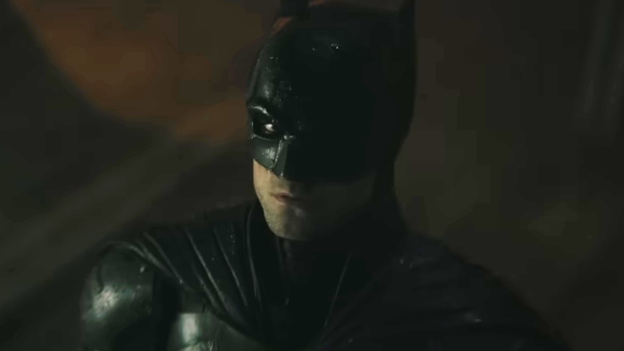 Robert Pattinson in full cape and cowl in The Batman