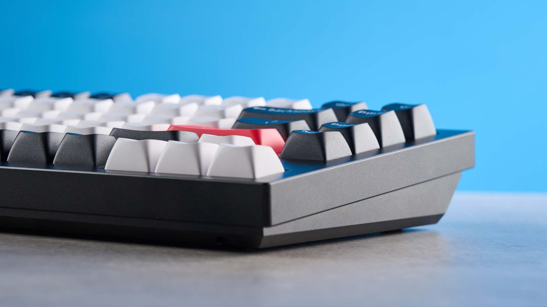 A black, white and red Keychron Q12 HE gaming keyboard with Hall Effect switches