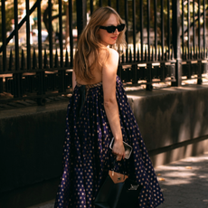 woman wearing a polka-dot dress in new york city