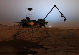In this artist's illustration, NASA's Phoenix Mars Lander begins to shut down operations as winter sets in.