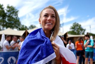 ELANCOURT, FRANCE - JULY 28: Gold medalist Pauline Ferrand Prevot of Team France celebrates after the Women’s Cross-Country Cycling Mountain Bike Gold Medal race on day two of the Olympic Games Paris 2024 at Elancourt Hill on July 28, 2024 in Elancourt, France. (Photo by Alex Broadway/Getty Images)