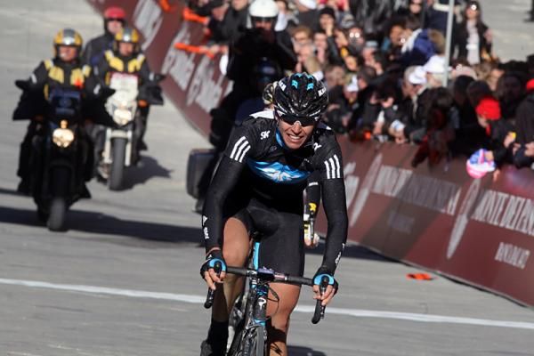 Defending champion Thomas L&ouml;fkvist (Sky) crosses the line in second place.