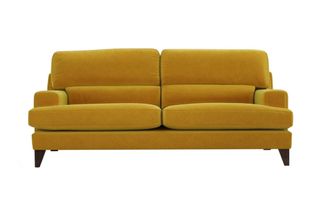 A yellow velvet mid-Century inspired sofa