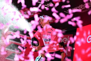 Tadej Pogačar celebrates keeping pink at the Giro d'Italia 2024