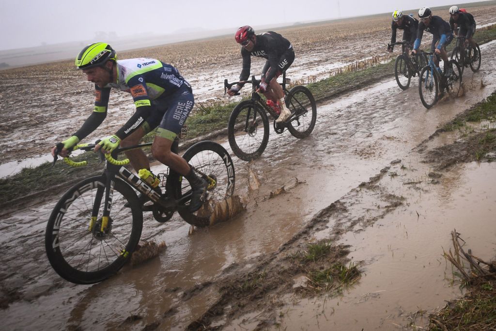 Intermarche Wanty Gobert Materiaux Team Wesley Kreder from Netherlands L and UAE Team Emirates Alexander Kristoff from Norway 2nd L compete during the 118th edition of the ParisRoubaix oneday classic cycling race between Compiegne and Roubaix northern France on October 3 2021 Photo by AnneChristine POUJOULAT AFP Photo by ANNECHRISTINE POUJOULATAFP via Getty Images