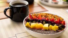 vegan breakfast bowl with fruit and chia seeds