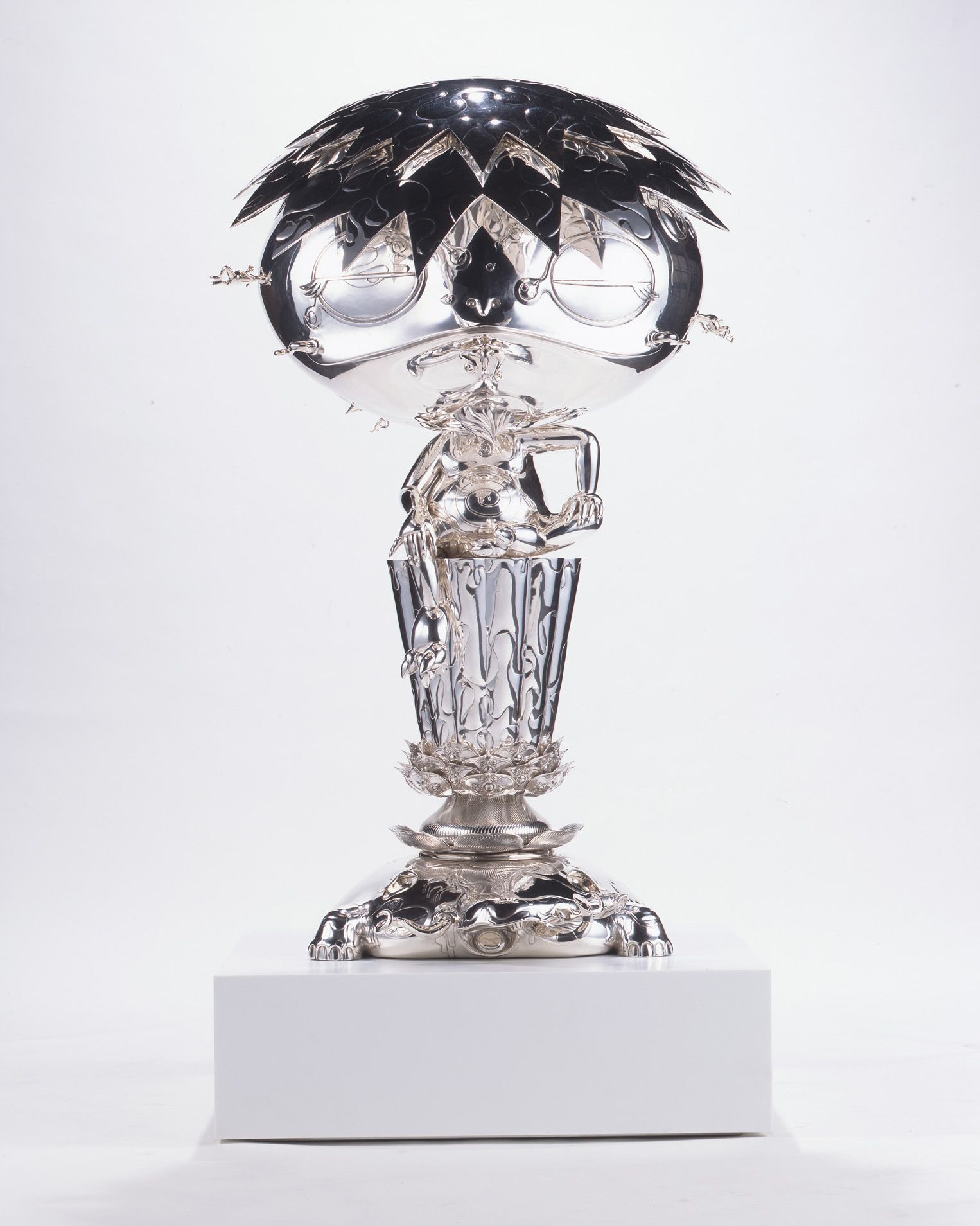 silver figure by Takashi Murakami