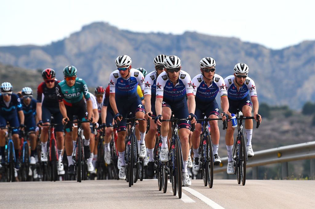 ALTO DE LAS ANTENAS DEL MAIGMO TIBI ALICANTE SPAIN FEBRUARY 04 LR Mikkel Frolich Honor of Denmark Michael Morkov of Denmark Yves Lampaert of Belgium and Josef Cerny of Czech Republic and Team QuickStep Alpha Vinyl lead the peloton during the 73rd Volta A La Comunitat Valenciana 2022 Stage 3 a 1551km stage from Alicante to Alto De Las Antenas Del Maigmo Tibi 1080m VCV2022 on February 04 2022 in Alicante Spain Photo by Dario BelingheriGetty Images