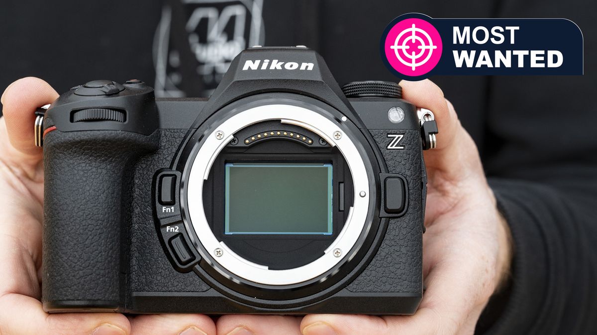 Nikon Z6 III camera in the hand with no lens attached and full-frame sensor on display