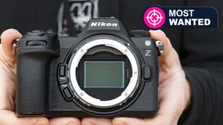 Nikon Z6 III camera in the hand with no lens attached and full-frame sensor on display