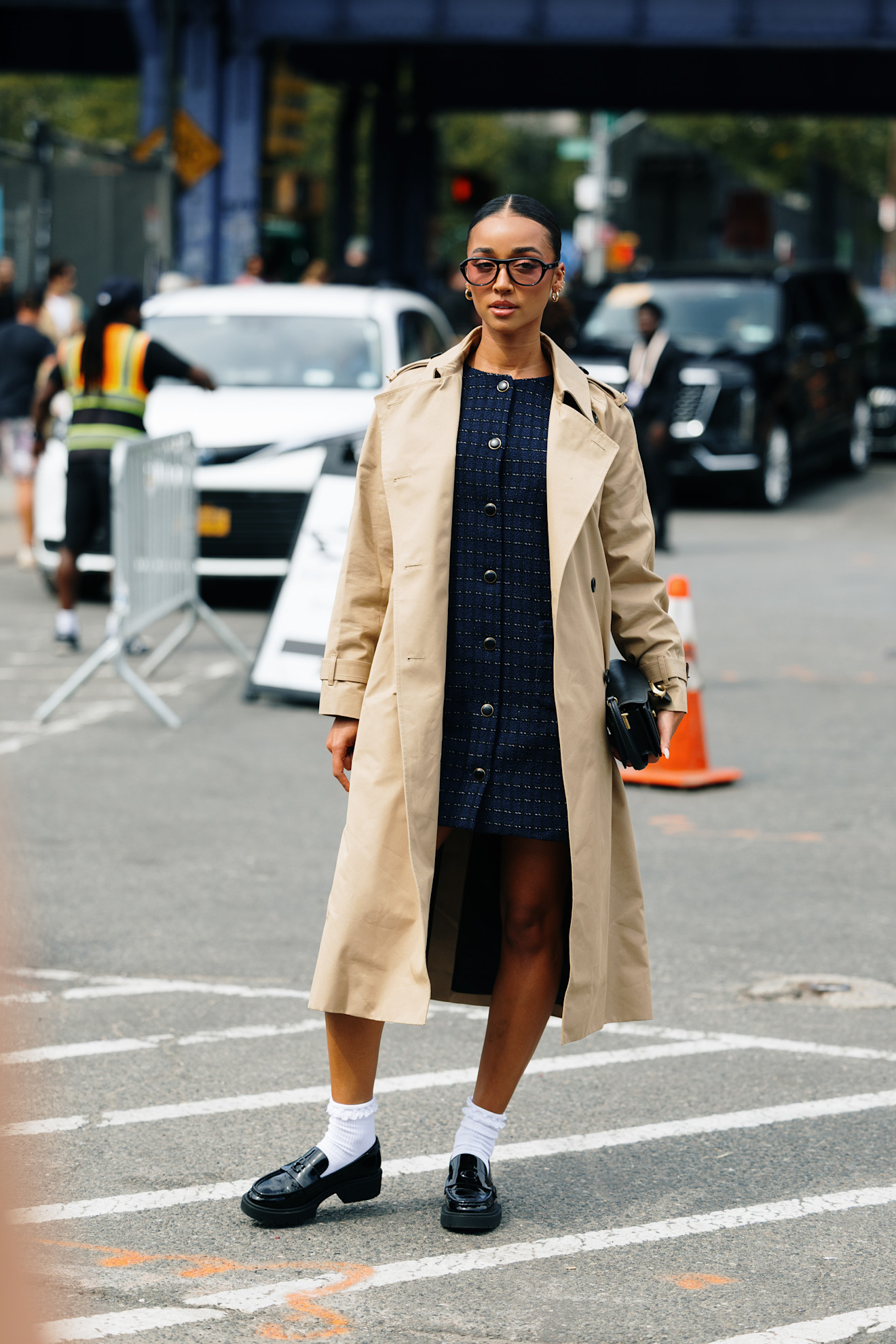 fashion week attendee wearing fall shoe trends to spring summer 2026 fashion week